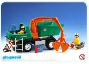 Dump truck with scoop