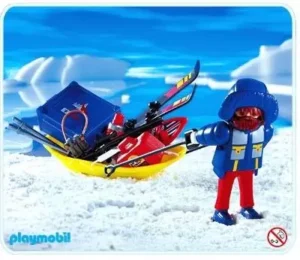 Polar researcher with sled