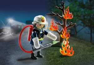 Fireman with burning tree