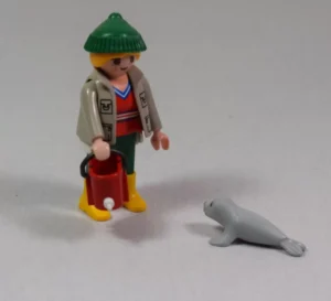 Animal Keeper With Baby Sea Lion