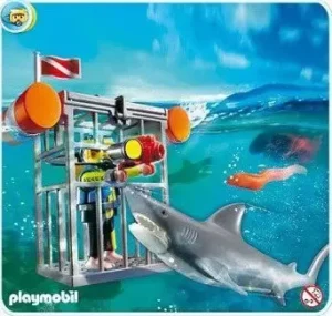Diver in cage with Shark