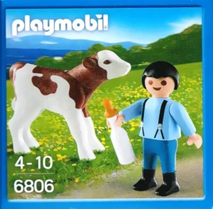Boy with Calf and Feeding Bottle