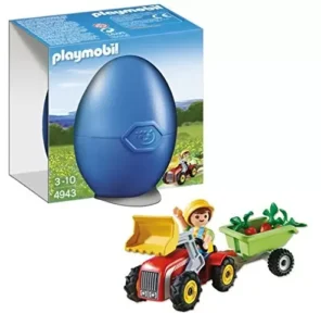 Boy with children’s tractor